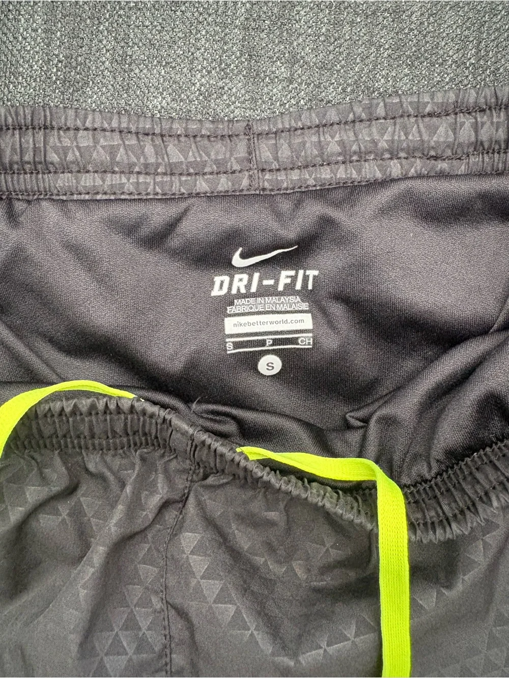 Nike Women’s Black Athletic Shorts with Neon Yellow Drawstring